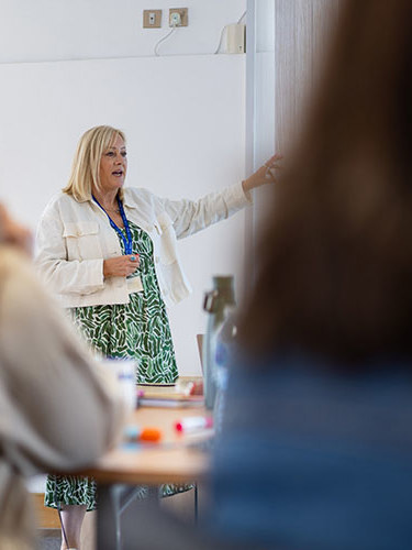A woman giving a presentation