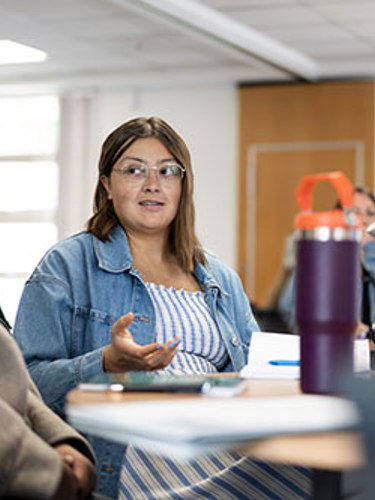 Woman speaking at a workshop